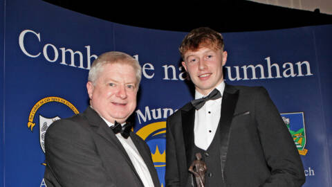 Killian Dennehy (Kerry) accepts the Minor Footballer of the Year Award from Munster GAA PRO Dermot 